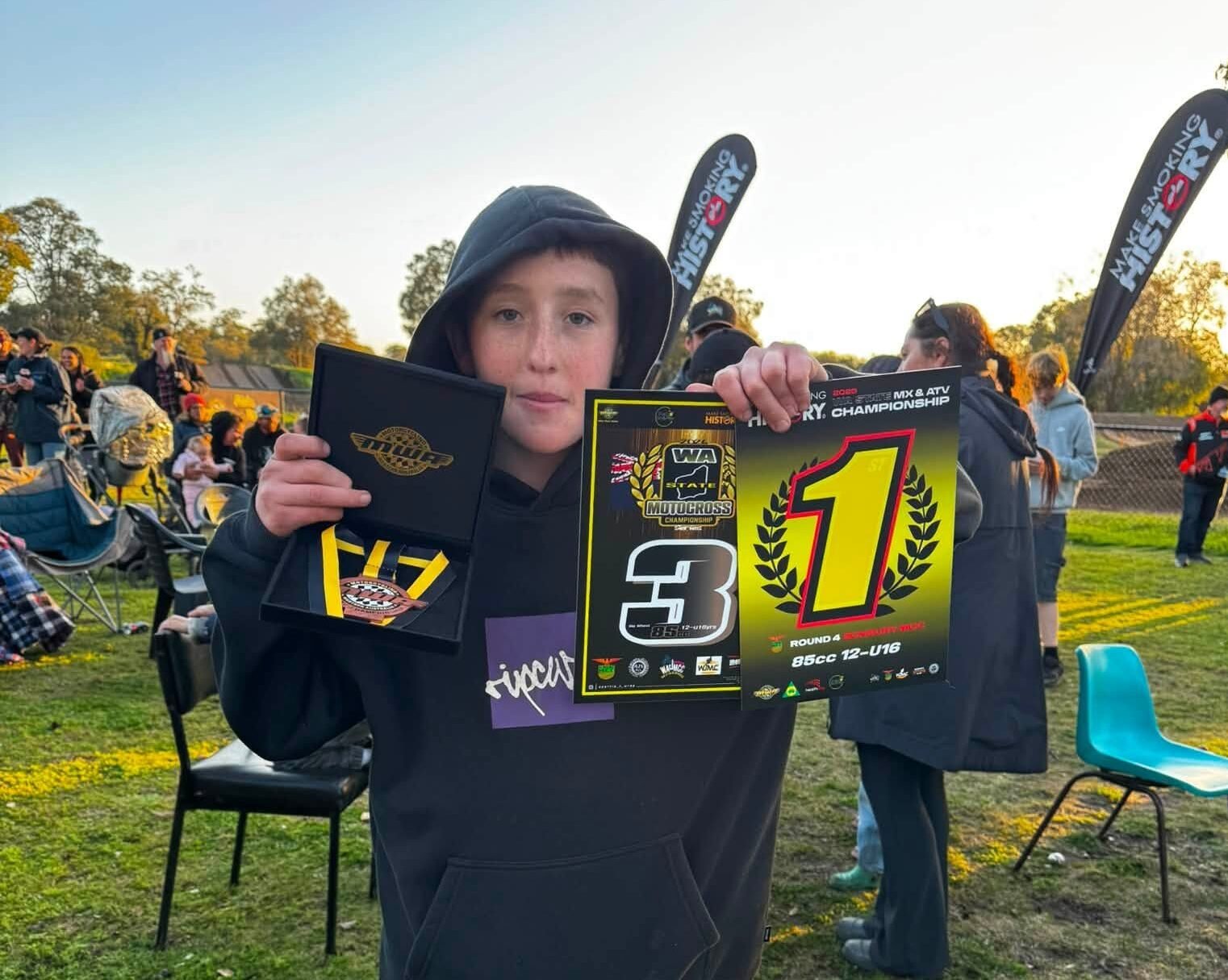 Evan Foley holding his 3rd Overall series and Round 4 1st place awards from the 2026 WA State MX & ATV Championship
