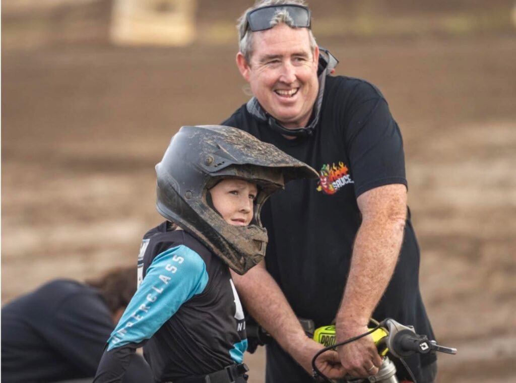 Evan Foley and his dad Wayne at the race track